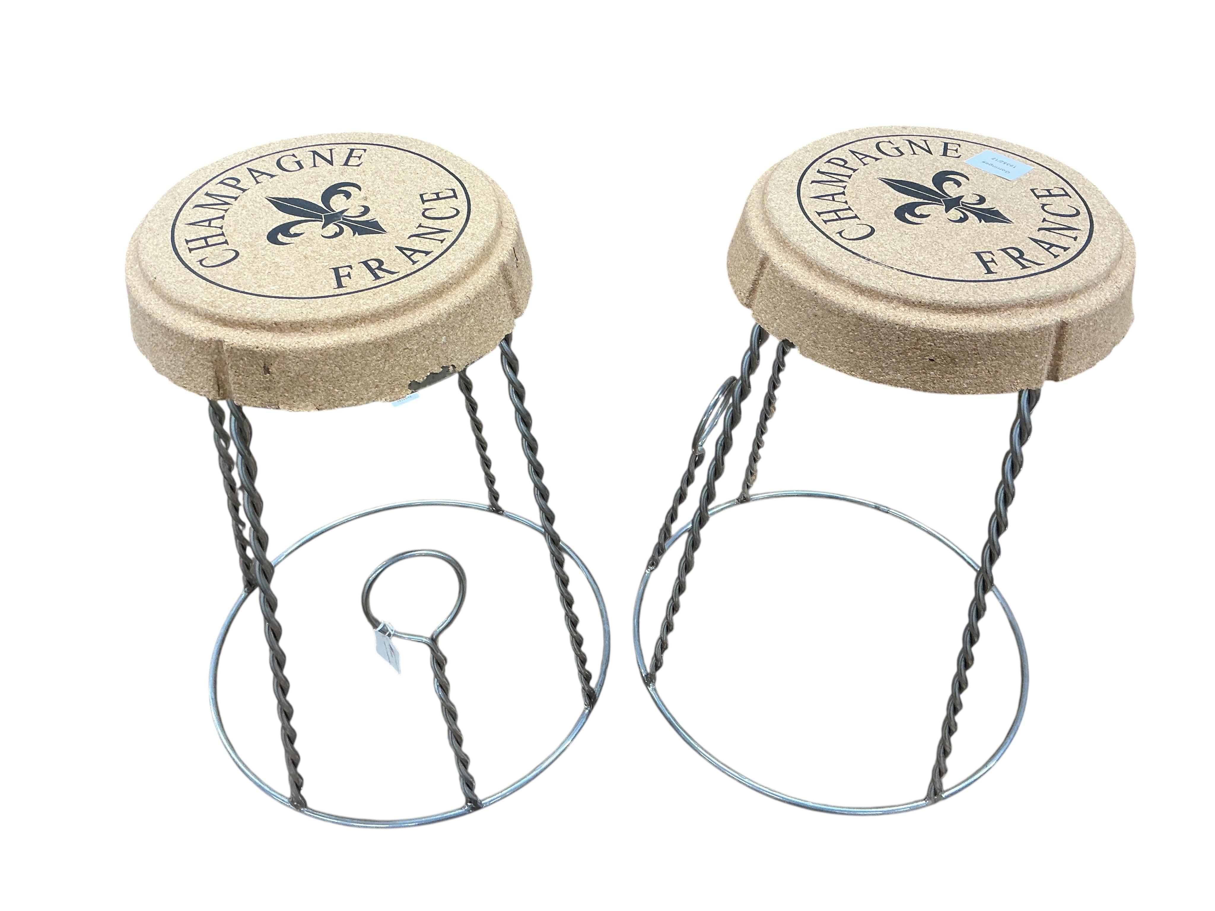 A pair of Contemporary 'champagne cork' stools, height 52cm